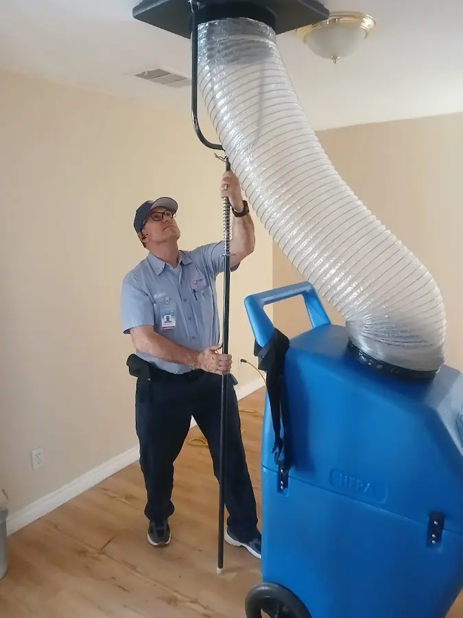 HVAC Installation technician using HEPA equipment in Joshua